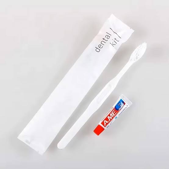 Hotel dental kit with toothbrush and toothpaste