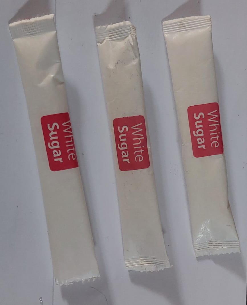 White sugar sachets